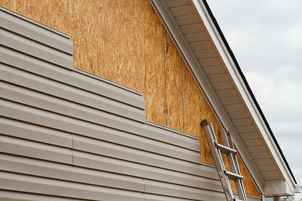 Professional Storm Damage Siding Repair technician working in Fairfield, TX